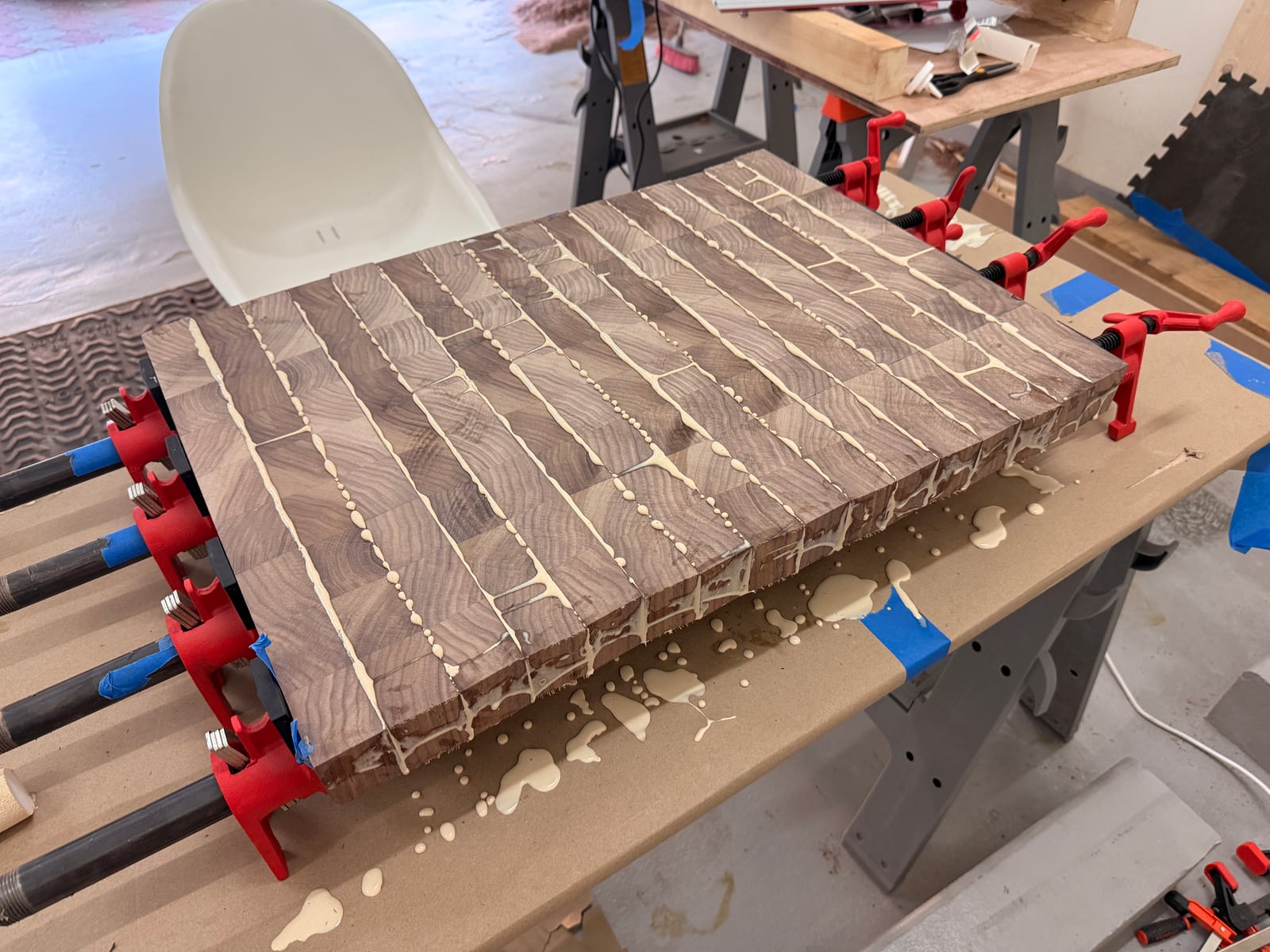 The end grain pattern in pipe clamps, glue squeezing out of every joint