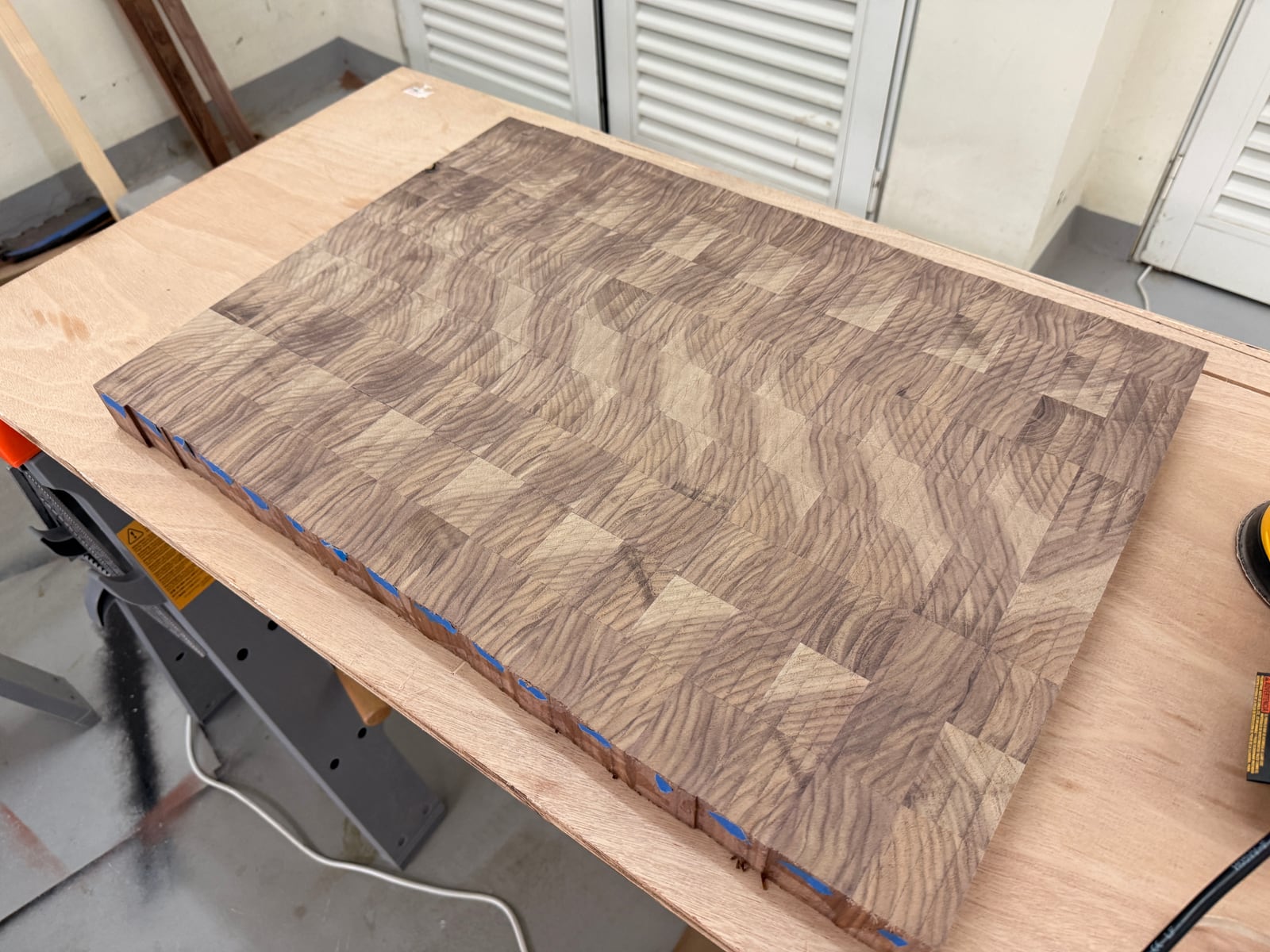 The end grain pattern after surfacing, with faint stripes left by the router bit