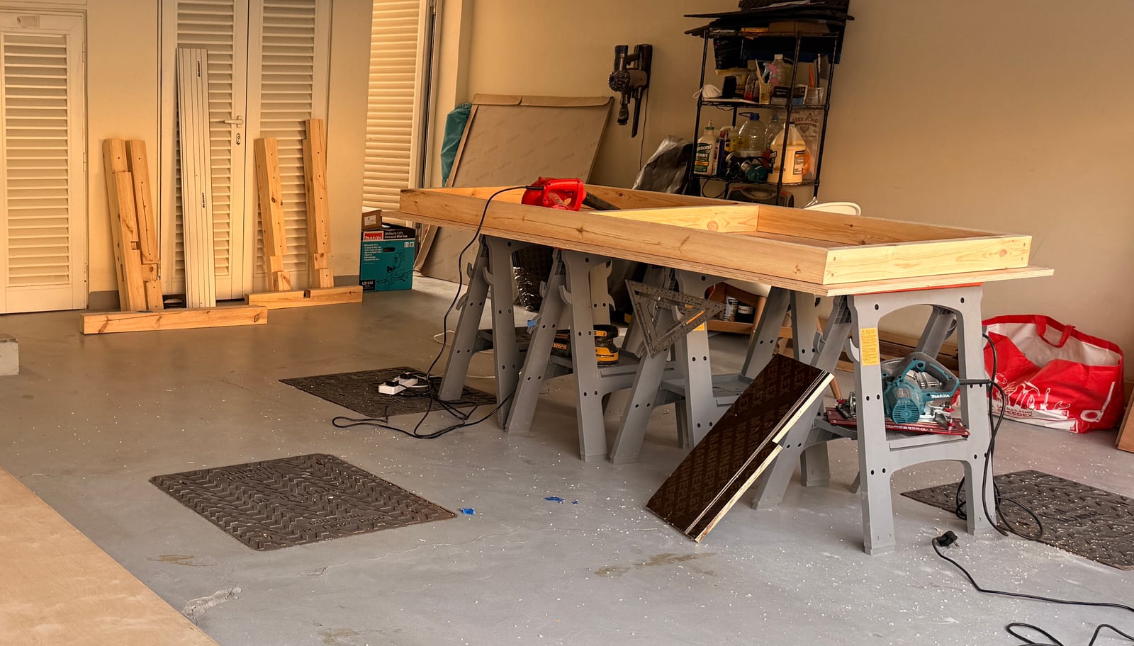 The workbench top assembled from 2x4s with mitered corners