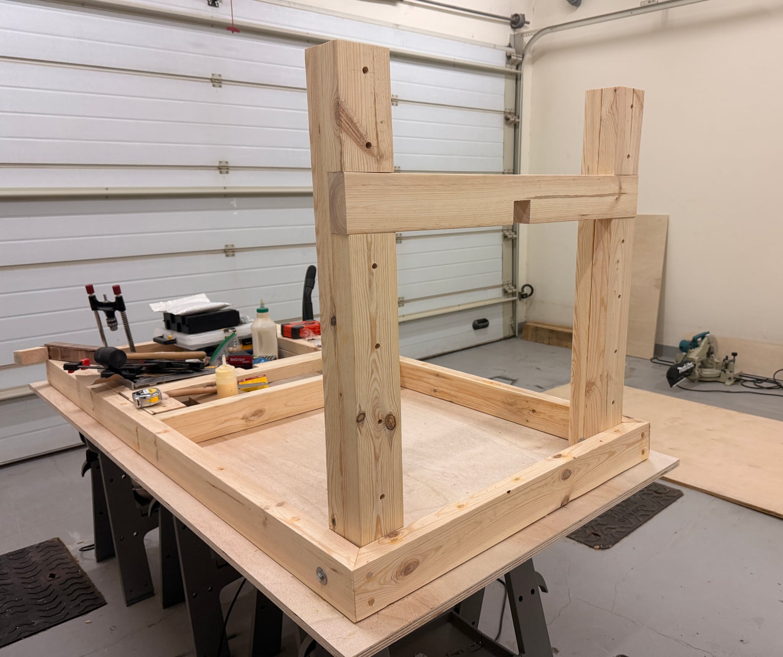 The workbench leg frame assembled and standing upside down on the bench top