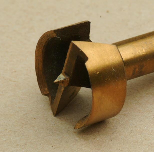 The tip of a Forstner bit