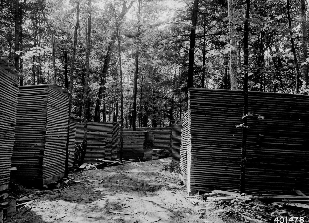 Rough-sawn hardwood lumber piled for air drying