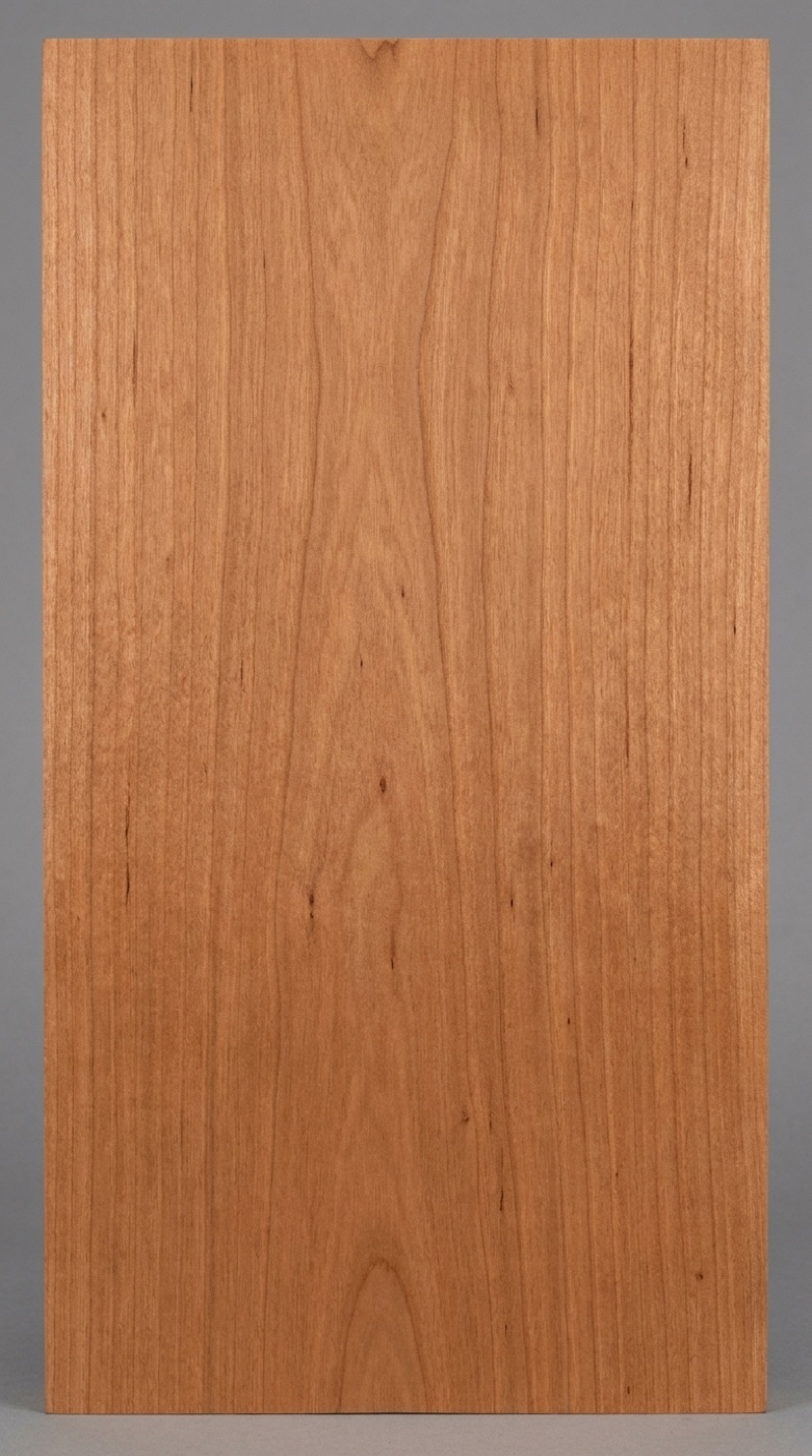 A board of American Cherry -- the medium reddish brown it darkens to with light exposure