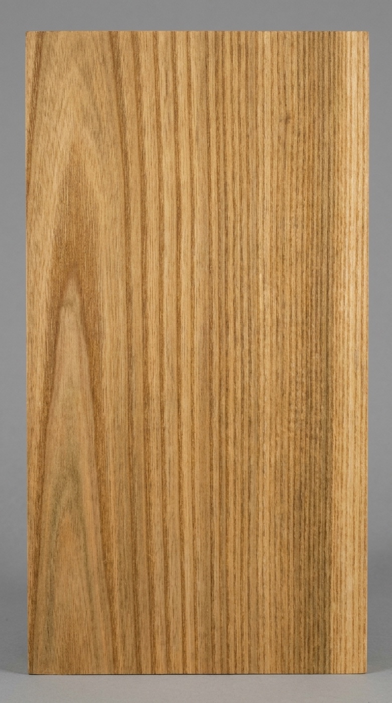 A board of black locust -- greenish-gold heartwood with strong ring-porous banding