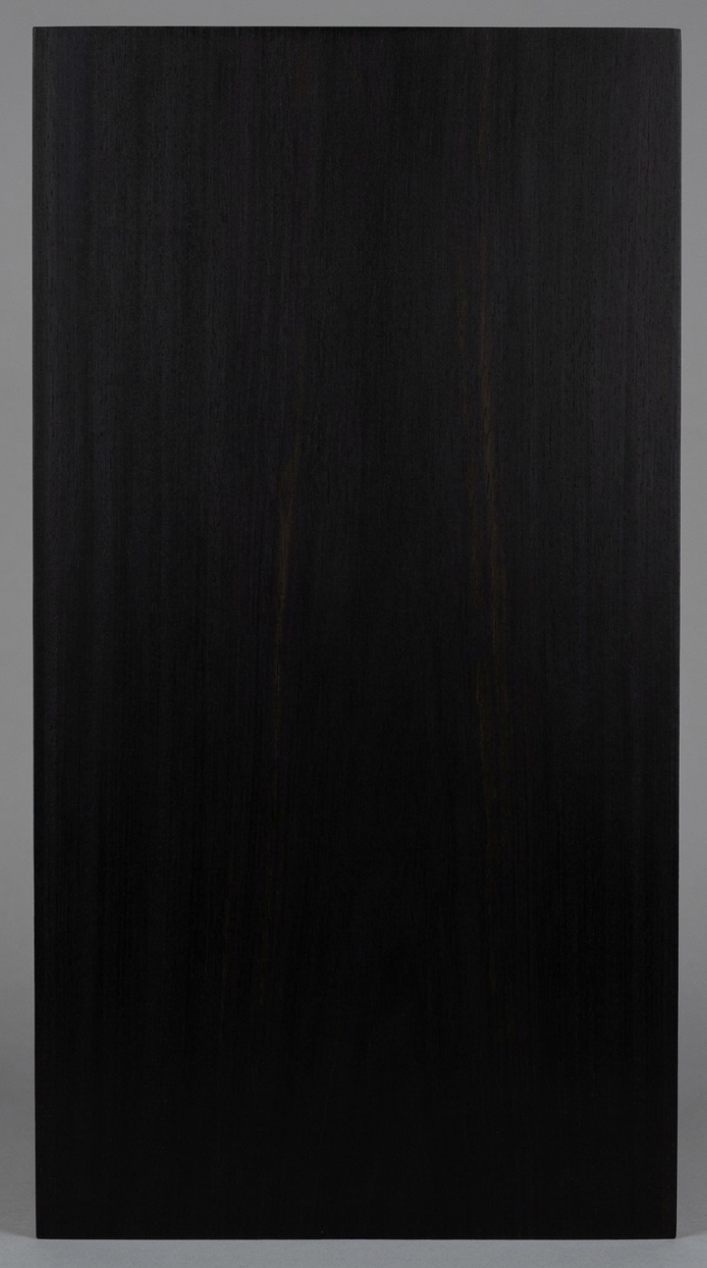 A board of Gaboon ebony -- near-uniform jet black with almost no visible grain